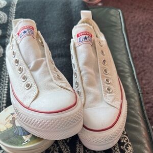 Brand new Converse white with red accents Slip-On Sneakers